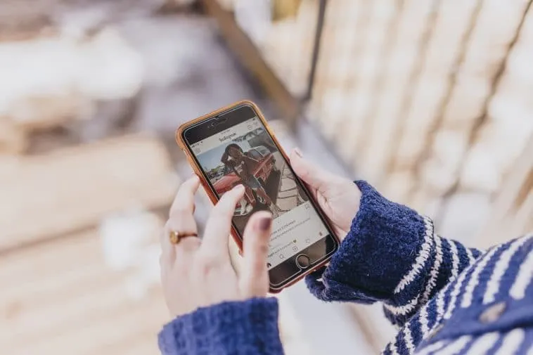 person-using-instagram – mobile marketing reads