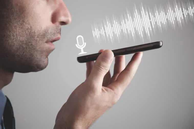 man talking smartphone using the voice recognition – mobile marketing reads