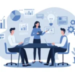 Three colleagues sit around a conference table with laptops while a woman presents a chart.