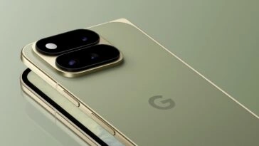 Close-up of a gold smartphone lying on its back, showing a dual-camera bump on the left side.