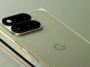 image1786465456 – mobile marketing reads Close-up of a gold smartphone lying on its back, showing a dual-camera bump on the left side.