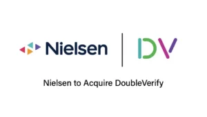 Nielsen and IDV logos with the headline 'Nielsen to Acquire DoubleVerify' announcing the acquisition