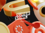 supersonic – mobile marketing reads Promotional 3D artwork for 'Super Sonic from Unity' featuring orange and gold retro phone elements on a black background