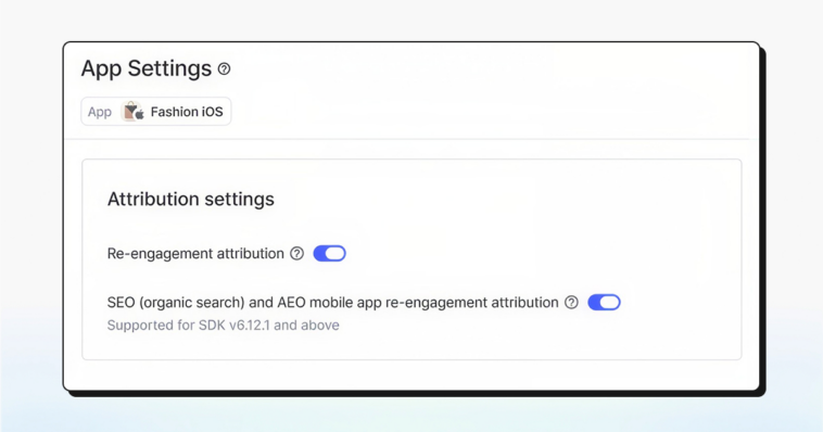 55528-blog_inline-2 – mobile marketing reads Screenshot of an App Settings panel titled 'App Settings' showing two toggle switches under 'Attribution settings': 'Re-engagement attribution' and 'SEO (organic search) and AEO mobile app re-engagement attribution' with a note 'Supported for SDK v6.12.1 and above'